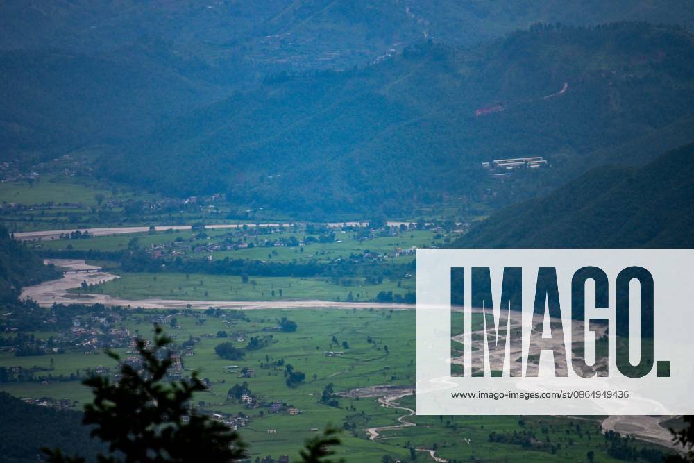 At Least 157 Killed As Devastating Flash Floods Hit Nepal NUWAKOT, NEPAL - AUGUST 26, 2026: A view of flash floods and mudslides along the Trishuli River. A catastrophic flash flood swept through Nepals northern border region after an ice-and-rock avalanche caused a sudden surge in the Lhende River near the Nepal-China border, sending massive volumes of water, mud and debris downstream into the Bhote Koshi and Trishuli river systems. The disaster devastated settlements in Rasuwa and Nuwakot districts, sweeping away homes, roads, bridges, vehicles and other infrastructure and severely damaging hydropower and power facilities. In Nuwakot, riverside settlements including Trishuli Bazaar, Devighat and Betrawati suffered extensive destruction