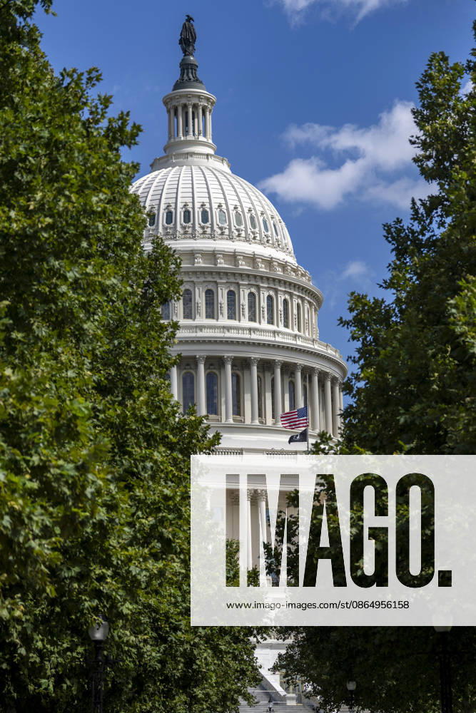 The American flag is lowered to half staff over the U.S. Capitol to honor the late country music singer and philanthropist Dolly Parton in Washington, DC on Wednesday, August 26, 2026. Parton died yesterday at the age of 80 after a brief battle with cancer. WAP20260826338 BONNIExCASH