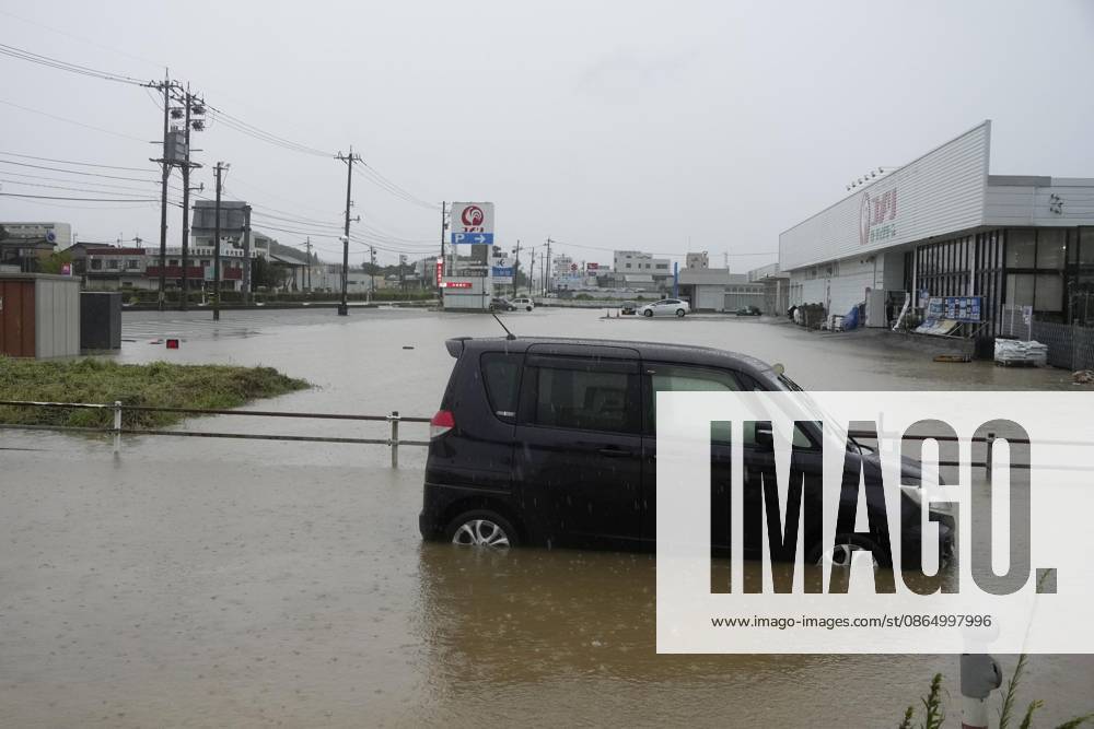Aftermath of torrential rain in central Japan Photo shows an abandoned vehicle in floodwater in Himi, Toyama Prefecture, on Aug. 27, 2026, following torrential rain. A14AA0005626664P