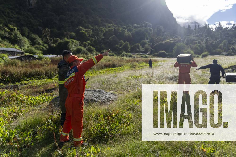 (260827) -- XIGAZE, Aug. 27, 2026 -- Rescuers prepare to fly a drone to inspect the mudslide-hit areas, in Xigaze, southwest China s Xizang Autonomous Region, Aug. 27, 2026. A mudslide, which occurred on the Nepalese side, struck Gyirong Port in Gyirong County of Xigaze City, Xizang, on Wednesday morning, leaving three people dead and 558 others, including 260 foreign nationals, missing, according to preliminary estimates. ) (SpotNews) CHINA-XIZANG-XIGAZE-MUDSLIDE-RESCUE (CN) TenzingxNimaxQadhup