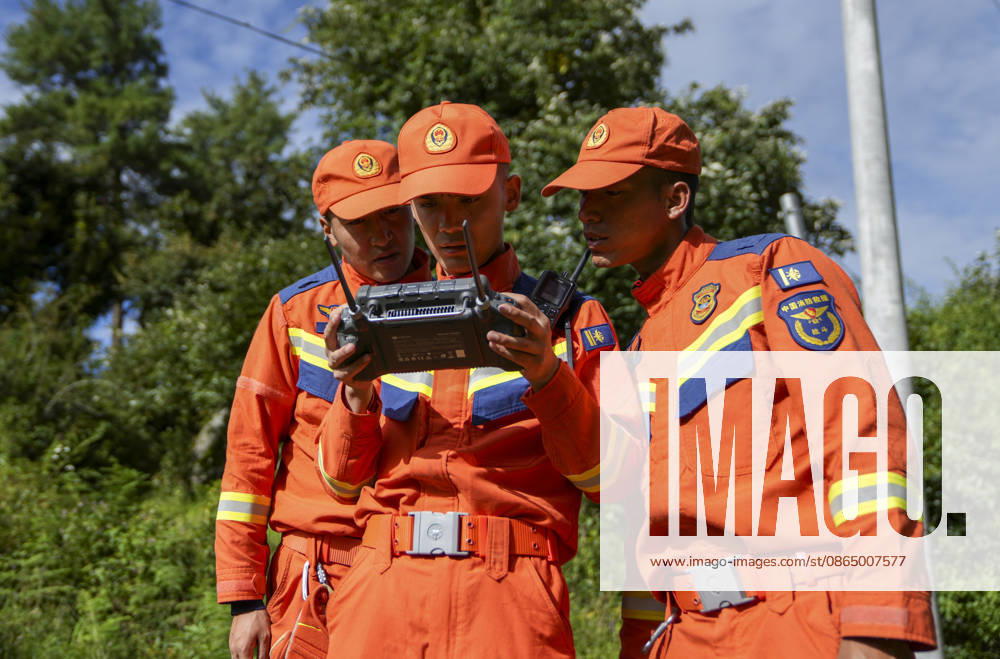 (260827) -- XIGAZE, Aug. 27, 2026 -- Rescuers inspect the mudslide-hit areas with a drone, in Xigaze, southwest China s Xizang Autonomous Region, Aug. 27, 2026. A mudslide, which occurred on the Nepalese side, struck Gyirong Port in Gyirong County of Xigaze City, Xizang, on Wednesday morning, leaving three people dead and 558 others, including 260 foreign nationals, missing, according to preliminary estimates. ) (SpotNews) CHINA-XIZANG-XIGAZE-MUDSLIDE-RESCUE (CN) JigmexDorje