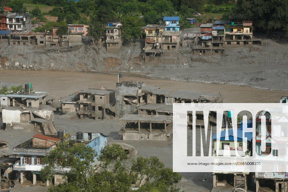 Flood Ravages Nuwakot Highway After Glacial Lake Outburst In Tibet A damaged section of a highway in Nuwakot, central Nepal, is seen on August 27, 2026, following a glacial lake outburst in Tibet. Rescue teams collect bodies, while residents displaced by the flooding shelter in elevated areas. The flooding has damaged roads and disrupted transportation in the region. Nuwakot Nepal