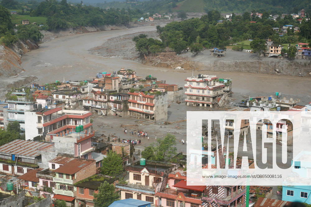 Flood Ravages Nuwakot Highway After Glacial Lake Outburst In Tibet A damaged section of a highway in Nuwakot, central Nepal, is seen on August 27, 2026, following a glacial lake outburst in Tibet. Rescue teams collect bodies, while residents displaced by the flooding shelter in elevated areas. The flooding has damaged roads and disrupted transportation in the region. Nuwakot Nepal
