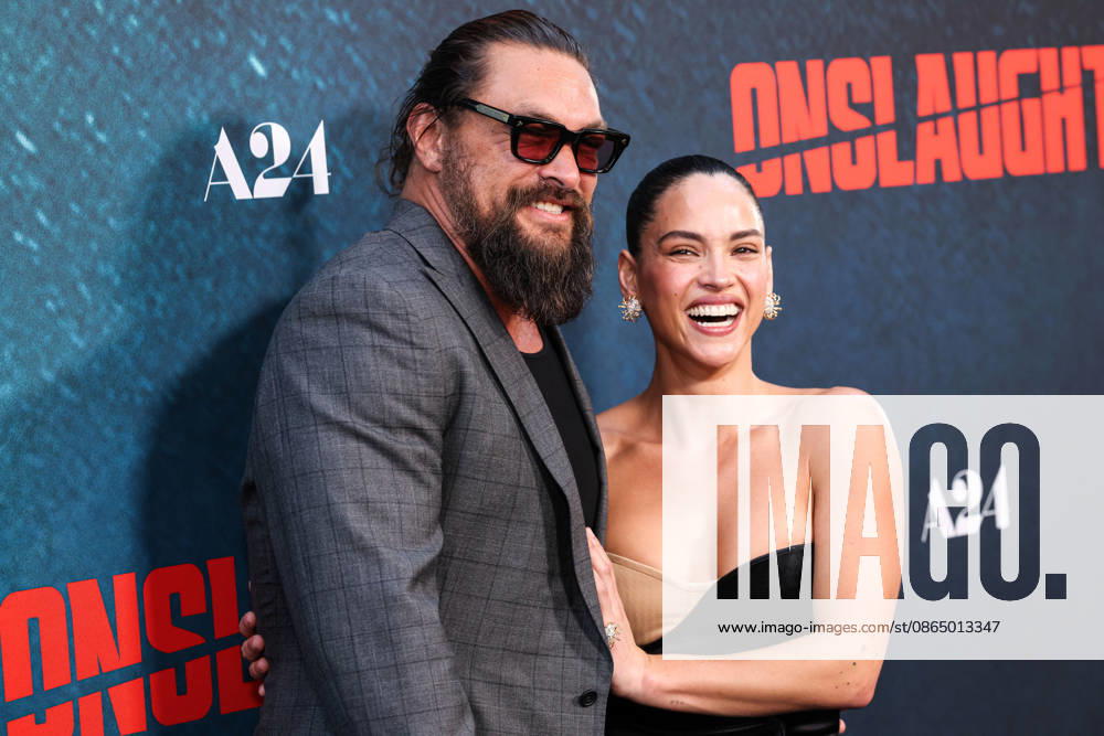 Los Angeles Premiere Of A24 s Onslaught LOS ANGELES, CALIFORNIA, USA - AUGUST 26: Jason Momoa and girlfriend Adria Arjona arrive at the Los Angeles Premiere Of A24 s Onslaught held at Regal LA Live on August 26, 2026 in Los Angeles, California, United States. Los Angeles Regal LA Live California United States