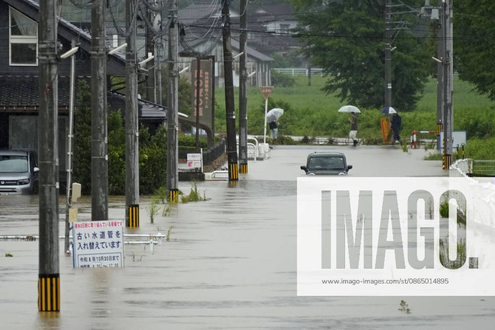 Torrential rain in central Japan Photo taken on Aug. 27, 2026, shows a submerged vehicle in Himi in Toyama Prefecture, central Japan, following torrential rain. A14AA0005626687P