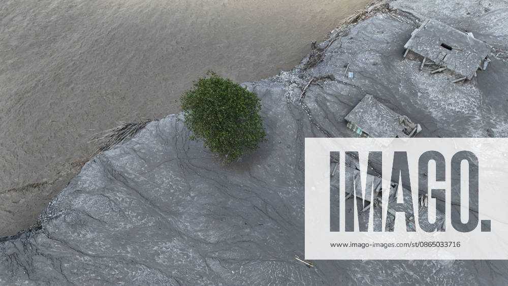 An aerial view shows buildings buried in mud and debris following flash floods at Devighat in Bidur Municipality, Nuwakot district, Nepal, on Thursday, August 27, 2026. The floods, triggered by a glacial collapse and debris flow upstream, have killed at least 270 people and left 826 others out of contact, according to Nepalese authorities, with search and rescue operations continuing. Nuwakot Nepal - ZUMAg200 20260827_zap_g200_003