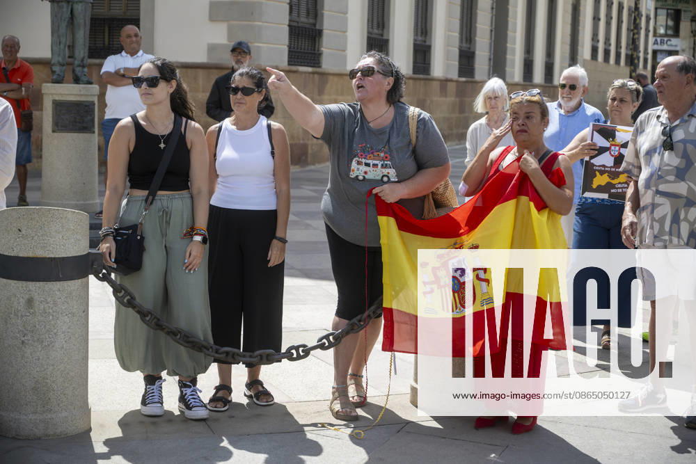 Ceuta Residents Protest in Front of City Hall Several people carry a Spanish flag while protesting in front of City Hall on August 27, 2026, in Ceuta, Spain. Ceuta residents denounce the government’s neglect and inaction one month after the mass influx of migrants on July 30. AUGUST 27, 2026 MIGRATION CRISIS Ceuta Ceuta, Spain
