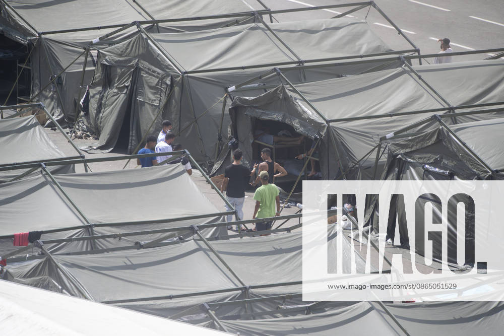The Army Sets Up More Tents in Loma Colmenar Several workers are setting up new tents in Loma Colmenar on August 27, 2026, in Ceuta, Spain. The Loma Colmenar encampment has become one of the main gathering points for migrants, which is why various improvement projects are underway to enhance conditions there. AUGUST 27, 2026 MIGRATION CRISIS Ceuta, Spain