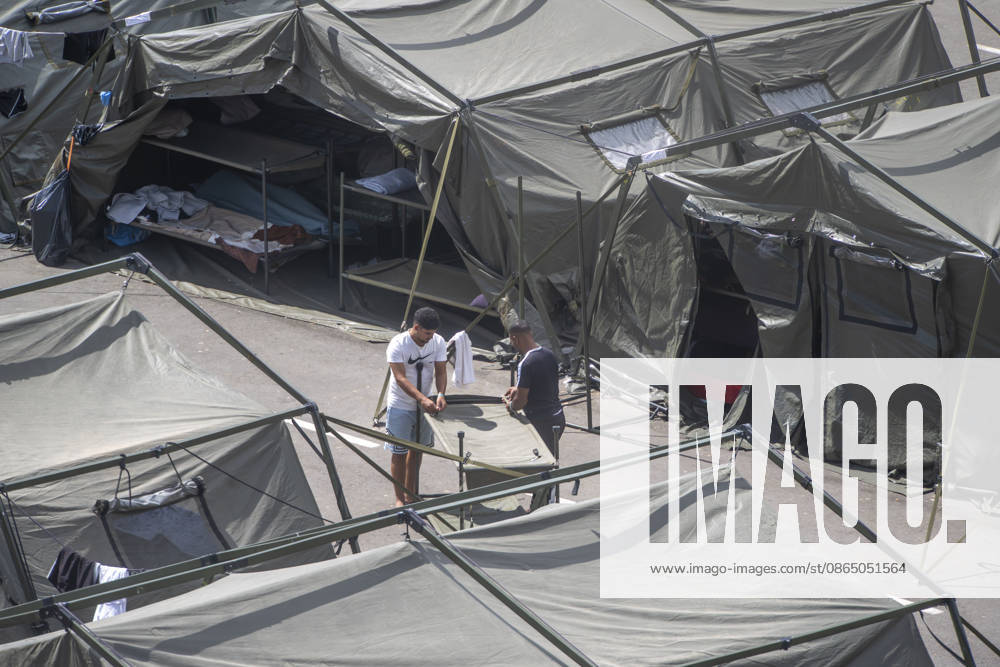The Army Sets Up More Tents in Loma Colmenar Several workers are setting up new tents in Loma Colmenar on August 27, 2026, in Ceuta, Spain. The Loma Colmenar encampment has become one of the main gathering points for migrants, which is why various improvement projects are underway to enhance conditions there. AUGUST 27, 2026 MIGRATION CRISIS Ceuta, Spain