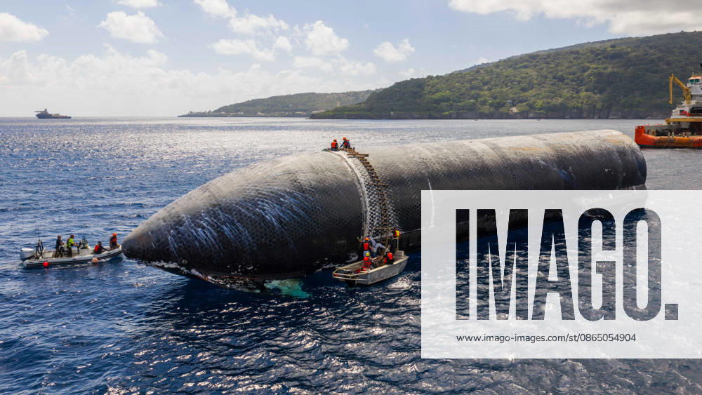 SpaceX engineers spent several days inspecting Ship 40 in the waters off Christmas Island as seen in pictures released on Thursday, August 27, 2026. They collected heatshield samples and gained vital insight into how the vehicle handled reentry, with improvements now planned for future vehicles. Starship has now been loaded onto a semi-submersible ship to begin the several-month journey back to Starbase. WAX2026082701 SPACEX