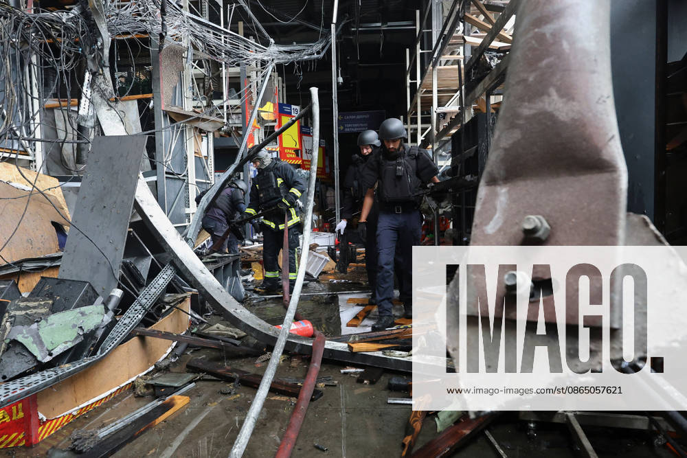 State Emergency Service rescuers work in an Epicenter hypermarket in the Osnovianskyi district, destroyed by a Russian drone attack, Kharkiv, Ukraine, August 27, 2026. A 40-year-old man was killed, and four others were injured in the strike. (Photo by Viacheslav Madiievskyi Ukrinform) Russian drone attacks home improvement hypermarket in Kharkiv