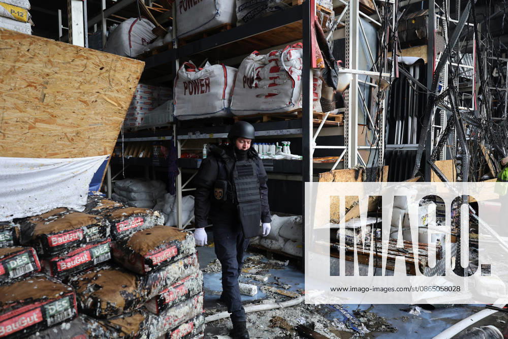 A rescuer works at an Epicenter hypermarket in the Osnovianskyi district, destroyed by a Russian drone attack, Kharkiv, Ukraine, August 27, 2026. A 40-year-old man was killed, and four others were injured in the strike. (Photo by Viacheslav Madiievskyi Ukrinform) Russian drone attacks home improvement hypermarket in Kharkiv