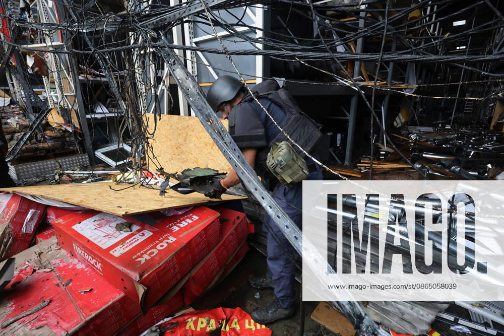 A rescuer works at an Epicenter hypermarket in the Osnovianskyi district, destroyed by a Russian drone attack, Kharkiv, Ukraine, August 27, 2026. A 40-year-old man was killed, and four others were injured in the strike. (Photo by Viacheslav Madiievskyi Ukrinform) Russian drone attacks home improvement hypermarket in Kharkiv