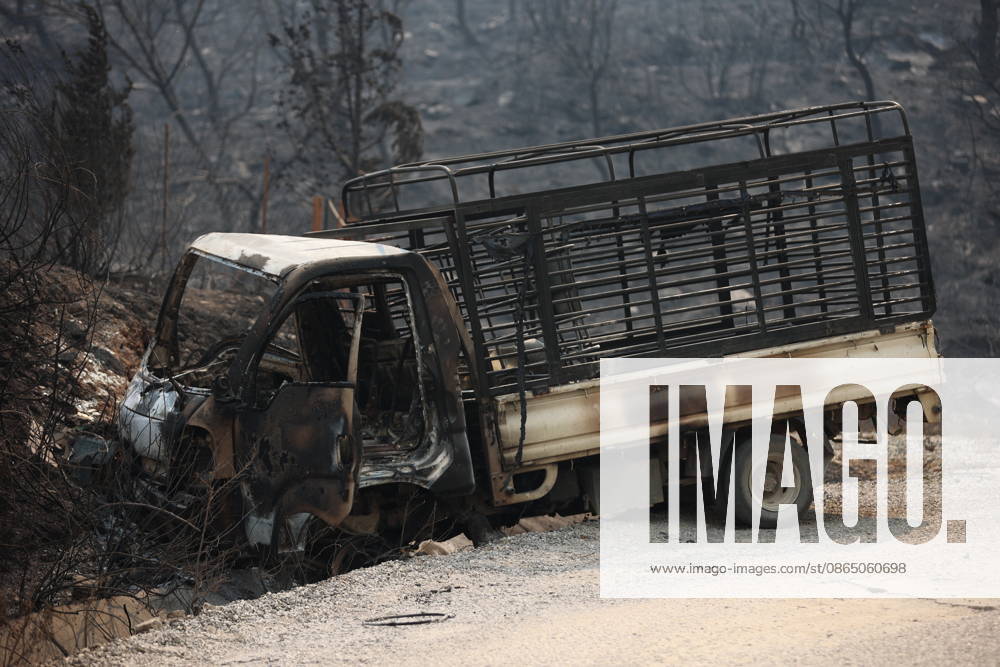Wildfires in Algeria claim at least 12 lives across several provinces JIJEL, ALGERIA - AUGUST 27: A view of a damaged vehicle as forest fires in eastern Algerian provinces turn green vegetation to ashes and cause material damage to homes and vehicles in the Beni Aicha village of Boraoui Belhadef Municipality in Jijel, Algeria on August 27, 2026. At least 12 people have died in wildfires that have swept through several provinces in Algeria, Interior Minister Said Sayoud said Wednesday, according to local media. The 159 fire outbreaks reported across the country have claimed five lives in Jijel, four in Bejaia and three in Tizi Ouzou. Hamza Zait Anadolu Jijel Algeria. Editorial use only. Please get in touch for any other usage.