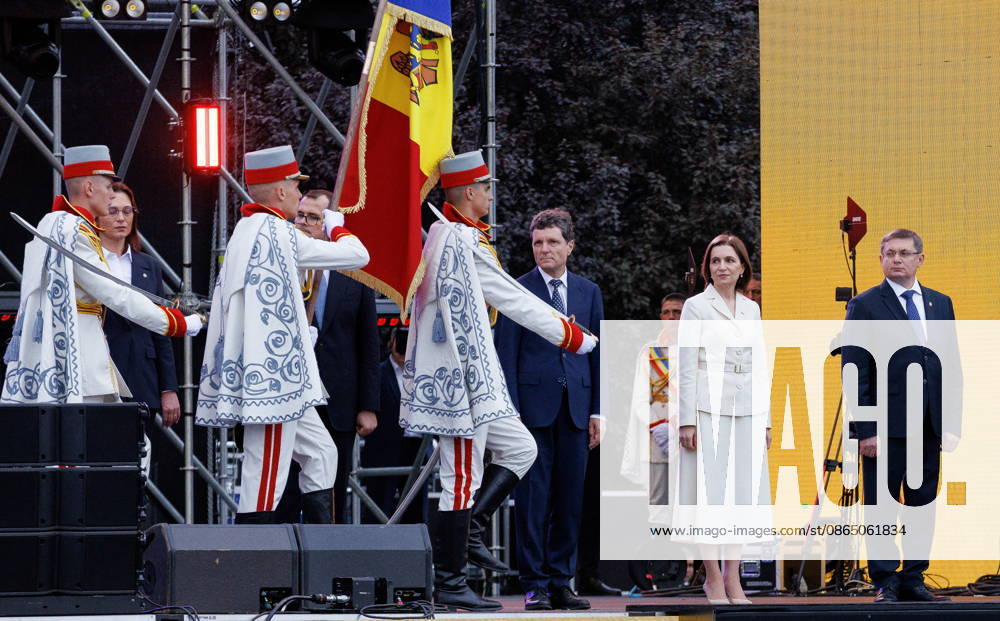 MOLDOVA, CHISINAU - AUGUST 27, 2026: Moldova’s President Maia Sandu (2nd R) attends a military parade marking 35 years of Moldova’s independence. More than 2,000 soldiers and military officers took part in the parade that featured more than 100 pieces of military and special hardware, including armoured vehicles, drones and other armaments provided by NATO member states. Vadim Denisov TASS 96705579