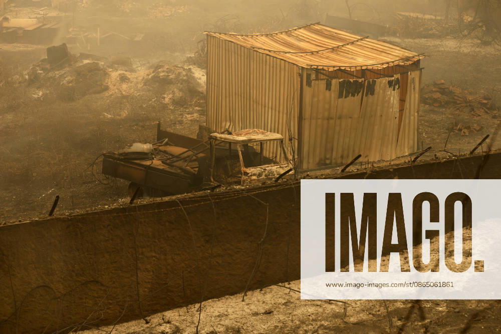 Fires in Jijel and Bedjaia: A general view of the burned houses, cars, and animals in the village of Nador, in the Jijel Mountains east of Algiers, in Algeria on August 27, 2026. The Algerian Ministry of the Interior announced that at least 12 people have died and 54 others have been injured in multiple forest fires across the country. Photo by Billel Bensalem, APP, Jijel, Algeria