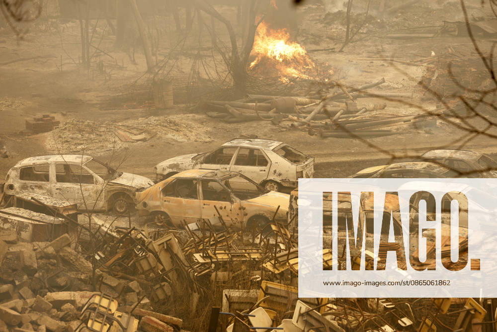 Fires in Jijel and Bedjaia: A general view of the burned houses, cars, and animals in the village of Nador, in the Jijel Mountains east of Algiers, in Algeria on August 27, 2026. The Algerian Ministry of the Interior announced that at least 12 people have died and 54 others have been injured in multiple forest fires across the country. Photo by Billel Bensalem, APP, Jijel, Algeria
