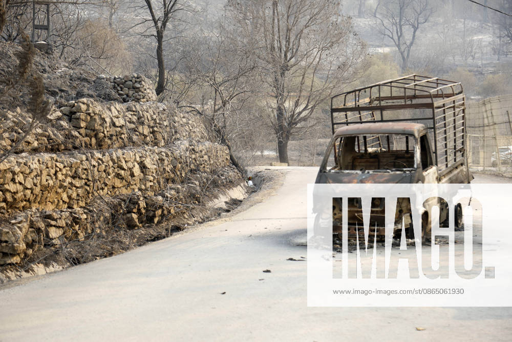 Fires in Jijel and Bedjaia: A general view of the burned-out houses, cars, and animals in the village of Nador, in the Jijel mountains east of Algiers, in Algeria on August 27, 2026. The Algerian Ministry of the Interior announced that at least 12 people have died and 54 others have been injured in multiple forest fires across the country. Photo by Billel Bensalem, APP, Jijel, Algeria
