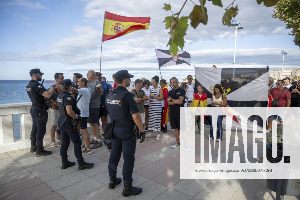 Protest Against Migrants in Ceuta: Several people during a demonstration to protest the situation caused by the mass arrival of migrants, on August 27, 2026, in Ceuta, Spain. Protesters attempted to block Red Cross volunteers from distributing food bags to migrants on Trampolín Beach and caused disturbances on Benítez Beach in Ceuta, which led to police charges, after they broke into the migrant encampments where people spend the night in the area and caused damage, including the burning of personal belongings. AUGUST 27, 2026 MIGRATION CRISIS Ceuta, Spain