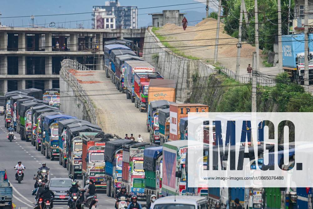 KATHMANDU, NEPAL, AUGUST 27, 2026: Trucks and other vehicles remain stranded along the Kalankiâ€Thankotâ€Nagdhunga route in Kathmandu as major highways remain closed following flash floods and landslides in parts of Nepal. The stranded vehicles occupy multiple lanes, causing severe traffic congestion and disrupting the movement of people and goods. The floods and landslides damaged roads, bridges, settlements and other infrastructure, while the closure of the Nagdhungaâ€Muglin route has disrupted a key road connection between Kathmandu and other parts of the country. Kathmandu Nepal - ZUMAq101 20260827_zna_q101_059