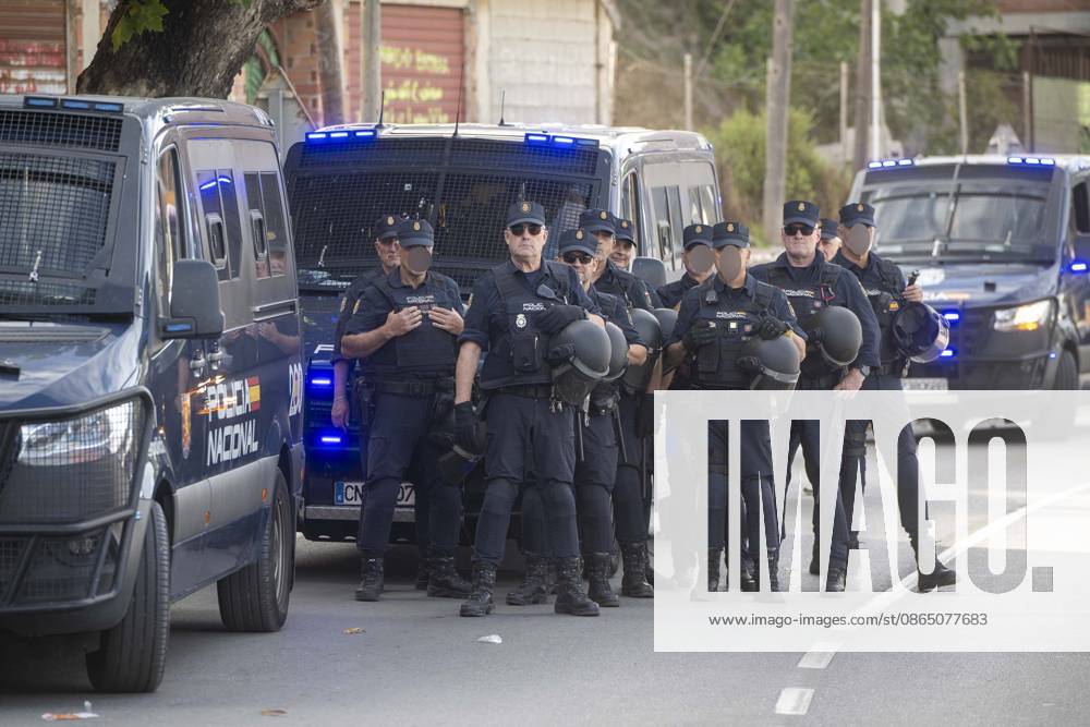 Protest Against Migrants in Ceuta: Police officers during a demonstration protesting the situation caused by the mass arrival of migrants, on August 27, 2026, in Ceuta, Spain. Protesters attempted to block Red Cross volunteers from distributing food bags to migrants on Trampolín Beach and caused disturbances on Benítez Beach in Ceuta, which led to police charges, after they broke into the migrant encampments where people spend the night in the area and caused damage, including the burning of personal belongings. AUGUST 27, 2026 PIXELATED MIGRATION CRISIS Ceuta Ceuta, Spain