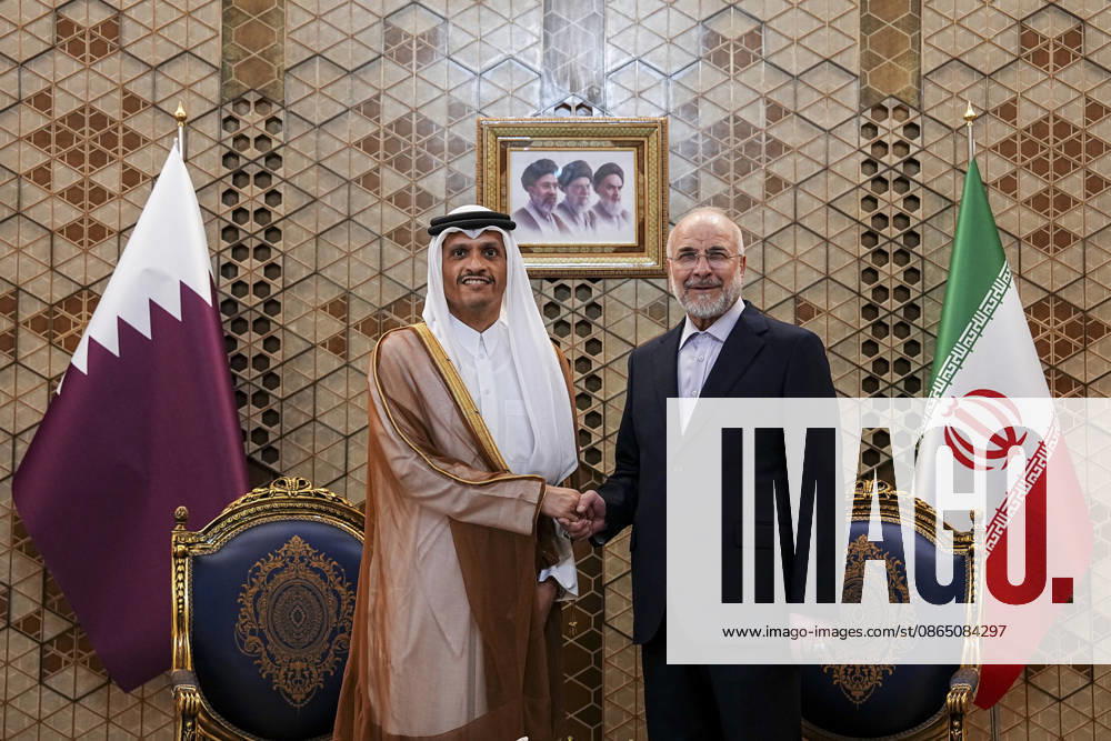 Qatar and Iran Discuss Diplomacy Qatars Prime Minister and Foreign Minister Sheikh Mohammed bin Abdulrahman bin Jassim Al Thani shakes hands with Iranian Parliament Speaker Mohammad Bagher Ghalibaf as they pose between the Qatari and Iranian flags in Tehran, Iran, on August 27, 2026. The two officials discussed regional developments, efforts to reduce tensions, and ways to create conditions for the resumption of diplomatic dialogue, with the Qatari prime minister stressing that diplomacy remained the best means of resolving disputes and preventing further escalation. Tehran Tehran Iran