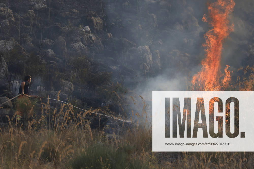 Firefighting efforts continue as wildfire burns in Sicily, Italy PALERMO, ITALY - AUGUST 27: A view of a wildfire that broke out on the slopes of Mount Gulino near Palermo in western Sicily, Italy, on August 27, 2026. Firefighters and forestry workers worked through the night to contain the flames and evacuate residents from settlements threatened by the fire. Two helicopters provided aerial support for firefighting efforts. Alberto Lo Bianco Anadolu Palermo Italy. Editorial use only. Please get in touch for any other usage.