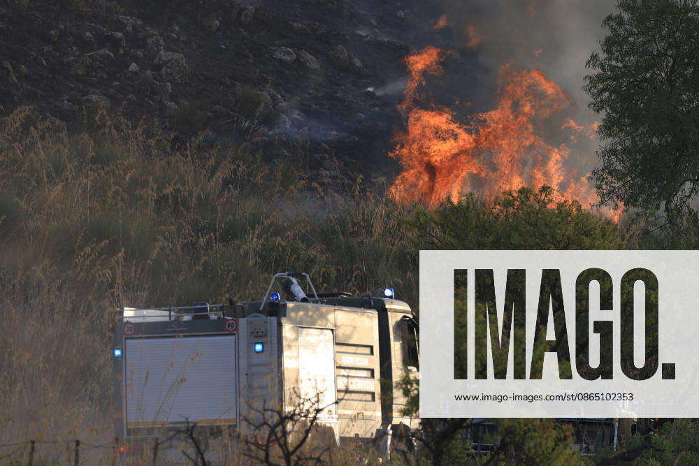 Firefighting efforts continue as wildfire burns in Sicily, Italy PALERMO, ITALY - AUGUST 27: Firefighters and forestry workers work to contain the flames after a wildfire broke out on the slopes of Mount Gulino near Palermo in western Sicily, Italy, on August 27, 2026. They work through the night to contain the flames and evacuate residents from settlements threatened by the fire. Two helicopters provide aerial support for firefighting efforts. Alberto Lo Bianco Anadolu Palermo Italy. Editorial use only. Please get in touch for any other usage.