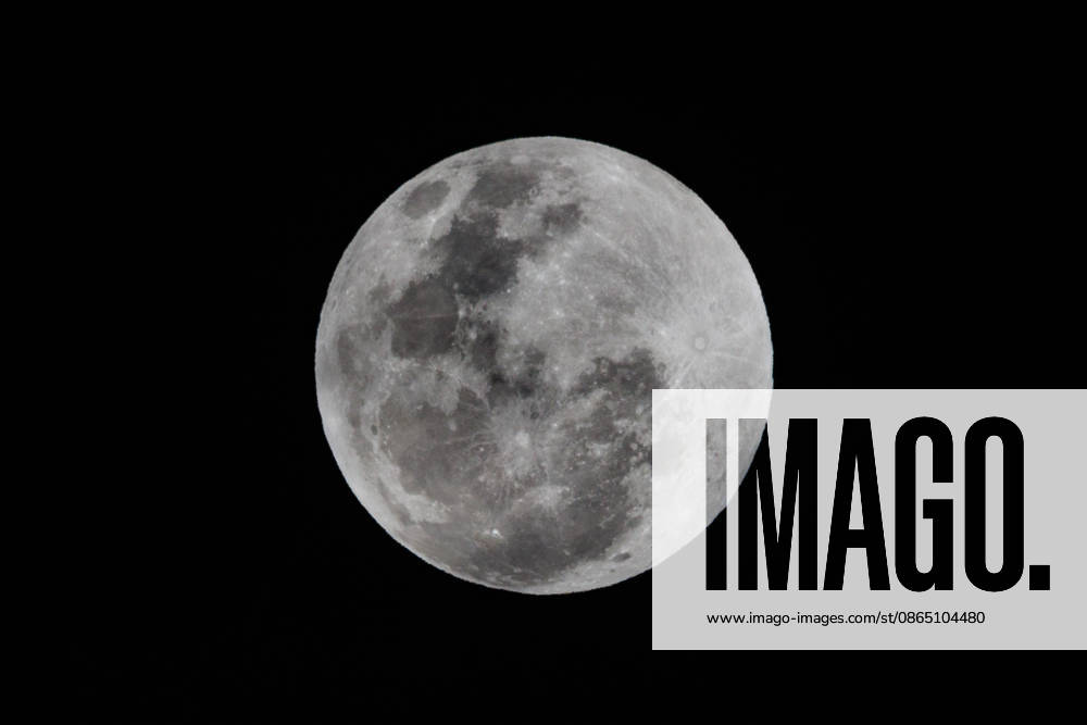 Santiago, August 27, 2026: A lunar eclipse known as the Blood Moon under cloudy skies in Santiago, Diego Martin Aton, Chile; Aton 1184787 jpeg