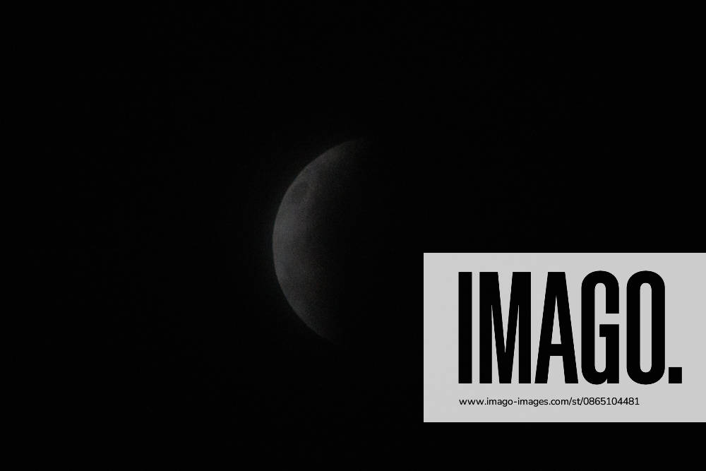 Santiago, August 27, 2026: Lunar eclipse known as the Blood Moon under cloudy skies in Santiago, Diego Martin Aton, Chile; Aton 1184788.jpeg