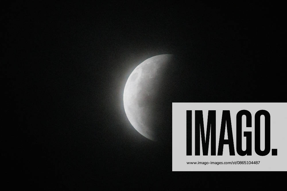 Santiago, August 27, 2026: Lunar eclipse known as the Blood Moon under cloudy skies in Santiago, Diego Martin Aton, Chile; Aton 1184792 jpeg