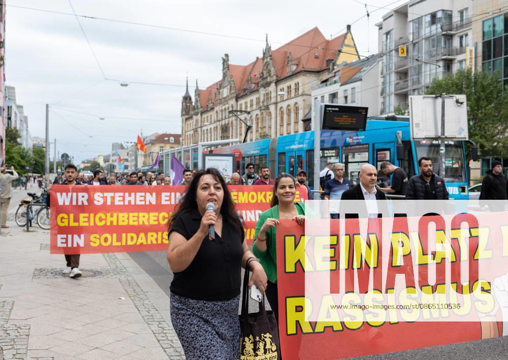 Migra-Streik rally against racism and social exclusion in Germany s Magdeburg MAGDEBURG, GERMANY - AUGUST 27: Business owners, organizers and supporters take part in a rally against racism and social exclusion outside the Saxony-Anhalt state parliament at Domplatz in Magdeburg, Germany, on August 27, 2026. The rally was held as part of the Migra-Streik, during which participating migrant-run businesses across Magdeburg voluntarily closed from 10 a.m. to 3 p.m. to call for solidarity and the protection of a free and democratic society, ahead of Saxony-Anhalt s state election on September 6. Somaya Abdelrahman Anadolu Magdeburg Germany. Editorial use only. Please get in touch for any other usage.