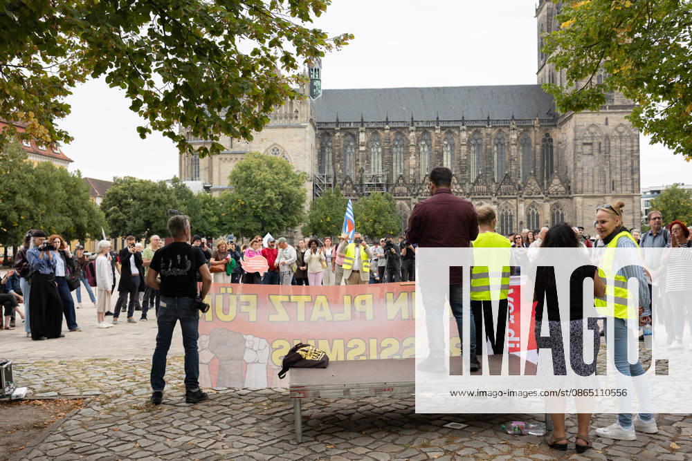 Migra-Streik rally against racism and social exclusion in Germany s Magdeburg MAGDEBURG, GERMANY - AUGUST 27: Business owners, organizers and supporters take part in a rally against racism and social exclusion outside the Saxony-Anhalt state parliament at Domplatz in Magdeburg, Germany, on August 27, 2026. The rally was held as part of the Migra-Streik, during which participating migrant-run businesses across Magdeburg voluntarily closed from 10 a.m. to 3 p.m. to call for solidarity and the protection of a free and democratic society, ahead of Saxony-Anhalt s state election on September 6. Somaya Abdelrahman Anadolu Magdeburg Germany. Editorial use only. Please get in touch for any other usage.