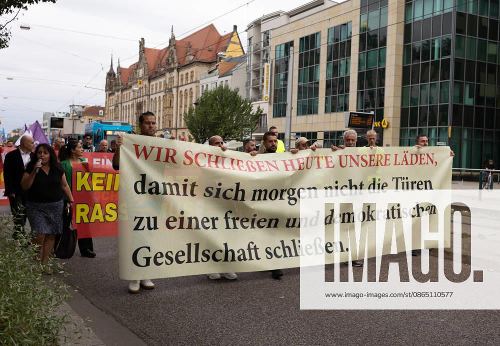 Migra-Streik rally against racism and social exclusion in Germany s Magdeburg MAGDEBURG, GERMANY - AUGUST 27: Business owners, organizers and supporters take part in a rally against racism and social exclusion outside the Saxony-Anhalt state parliament at Domplatz in Magdeburg, Germany, on August 27, 2026. The rally was held as part of the Migra-Streik, during which participating migrant-run businesses across Magdeburg voluntarily closed from 10 a.m. to 3 p.m. to call for solidarity and the protection of a free and democratic society, ahead of Saxony-Anhalt s state election on September 6. Somaya Abdelrahman Anadolu Magdeburg Germany. Editorial use only. Please get in touch for any other usage.
