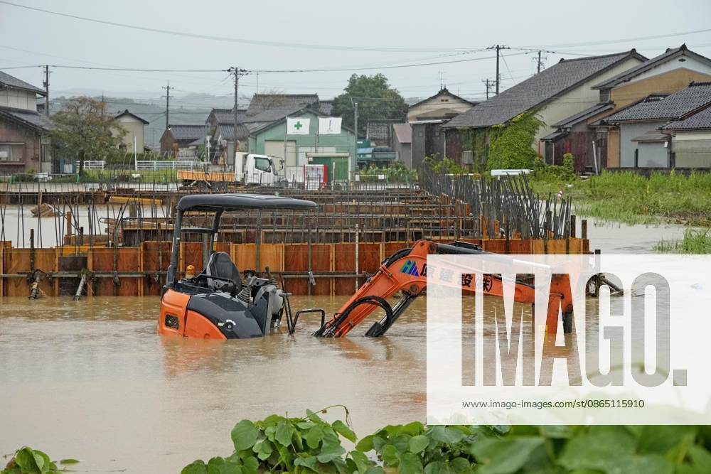 Torrential rain in central Japan Photo taken Aug. 27, 2026, shows submerged heavy equipment in Himi in Toyama Prefecture, central Japan, following torrential rain. A14AA0005626703P