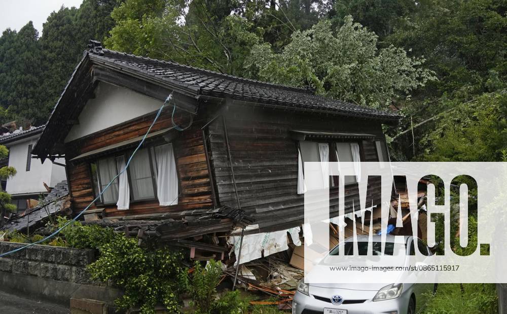 Torrential rain in central Japan Photo taken Aug. 27, 2026, shows a collapsed house in Himi in Toyama Prefecture, central Japan, following torrential rain. A14AA0005626708P