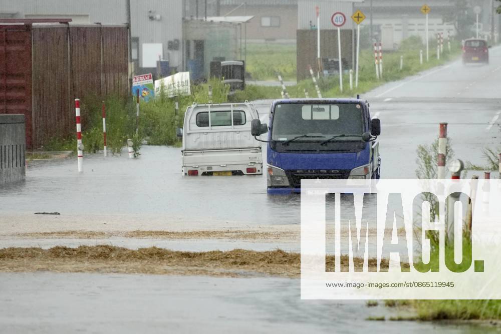 Torrential rain in central Japan Photo shows submerged vehicles on a road in Himi in Toyama Prefecture, central Japan, on Aug. 28, 2026, following torrential rain. A14AA0005626744P