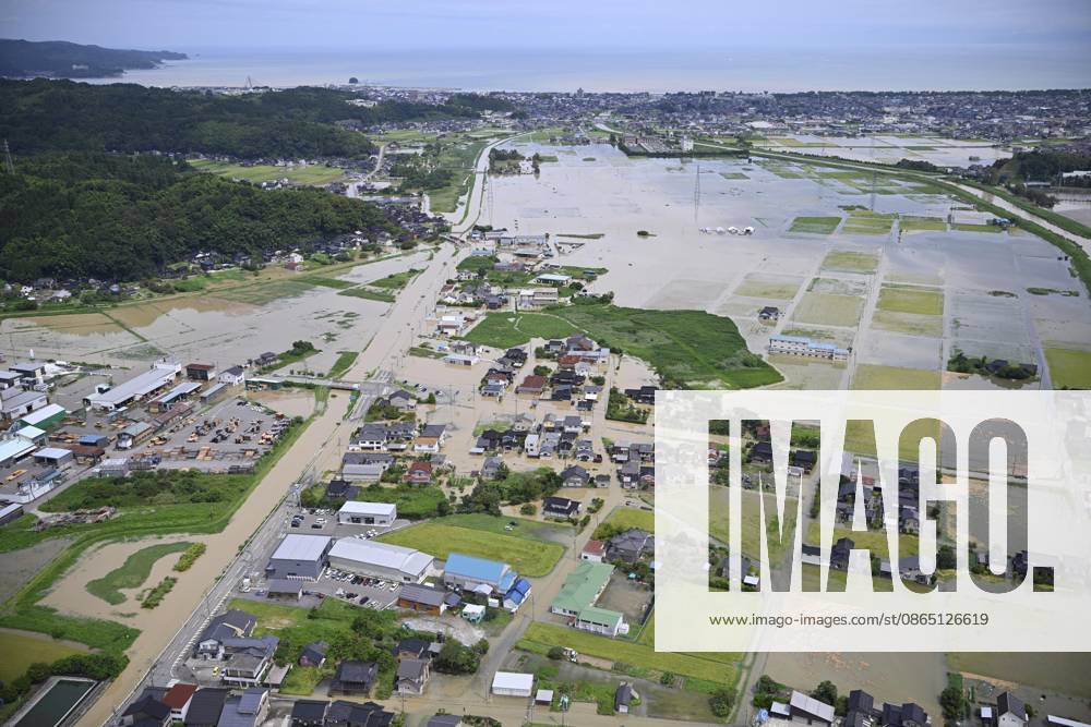 Torrential rain in central Japan Photo taken from a Kyodo News helicopter on Aug. 28, 2026, shows a submerged area in Himi in Toyama Prefecture, central Japan, following torrential rain. A14AA0005626751P