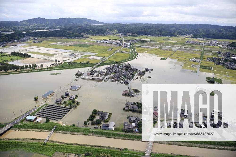 Torrential rain in central Japan Photo taken from a Kyodo News helicopter on Aug. 28, 2026, shows a submerged area in Himi in Toyama Prefecture, central Japan, following torrential rain. A14AA0005626753P