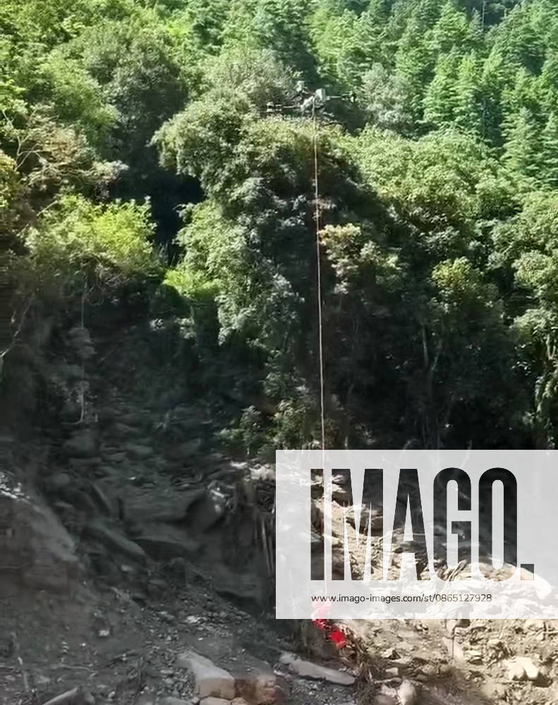 (260828) -- BEIJING, Aug. 28, 2026 () -- This photo taken on Aug. 28, 2026 shows rescue operations underway at the mudslide-hit area. Emergency rescue operations have been carried out in an orderly and well-coordinated manner after a mudslide struck Gyirong Port in Gyirong County, southwest China s Xizang Autonomous Region on Wednesday morning. () (SpotNews) CHINA-XIZANG-GYIRONG-MUDSLIDE-RESCUE (CN) Xinhua