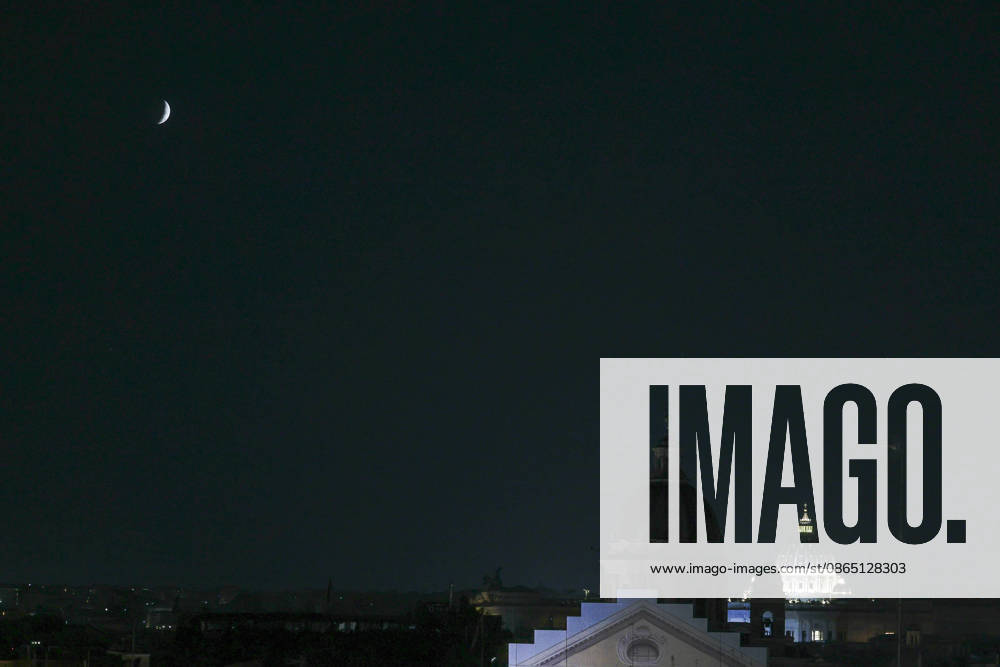Partial Lunar Eclipse over Rome ROME, ITALY - AUGUST 28: The moon is seen over Sant Ambrogio e Carlo al Corso dome and St. Peter s dome (R) during the partial lunar eclipse in Rome, Italy, on August 28, 2026. Riccardo De Luca Anadolu Rome Italy. Editorial use only. Please get in touch for any other usage.