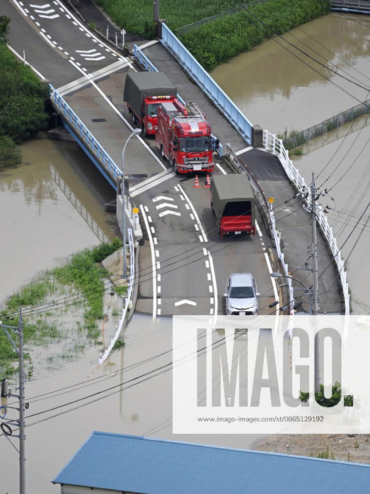 Torrential rain in central Japan Photo taken from a Kyodo News helicopter on Aug. 28, 2026, shows a submerged road and a river in Himi in Toyama Prefecture, central Japan, following torrential rain. A14AA0005626756P