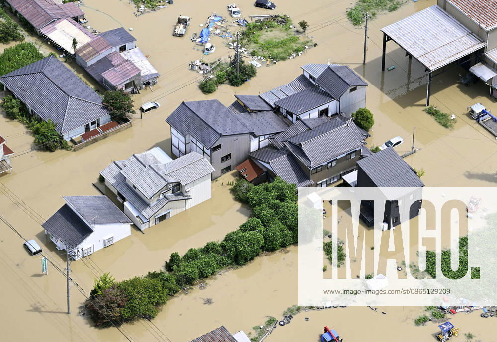 Torrential rain in central Japan Photo taken from a Kyodo News helicopter on Aug. 28, 2026, shows submerged houses in Himi in Toyama Prefecture, central Japan, following torrential rain. A14AA0005626757P
