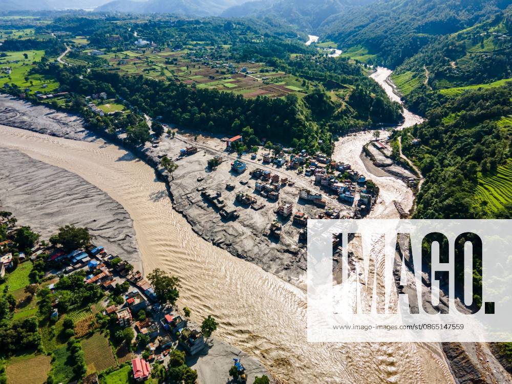 NUWAKOT, NEPAL †AUGUST 28, 2026: An aerial view shows the aftermath of severe flooding along the Bhotekoshi River in Nuwakot, Nepal. The flooding affected low-lying areas and settlements near the riverbanks, causing widespread damage to homes, roads, bridges, a hydropower station and other infrastructure. Several people remain missing as authorities continue to assess the extent of the disaster. Rescue teams and security personnel are conducting search and rescue operations in the affected areas. Nuwakot Nepal - ZUMAq101 20260828_zna_q101_126