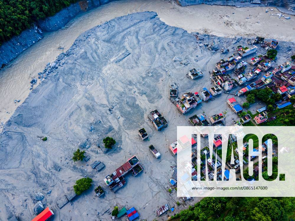 NUWAKOT, NEPAL †AUGUST 28, 2026: An aerial view shows the aftermath of severe flooding along the Bhotekoshi River in Nuwakot, Nepal. The flooding affected low-lying areas and settlements near the riverbanks, causing widespread damage to homes, roads, bridges, a hydropower station and other infrastructure. Several people remain missing as authorities continue to assess the extent of the disaster. Rescue teams and security personnel are conducting search and rescue operations in the affected areas. Nuwakot Nepal - ZUMAq101 20260828_zna_q101_128