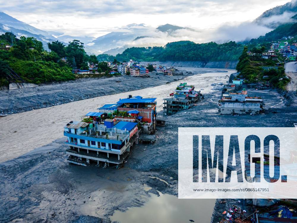 NUWAKOT, NEPAL †AUGUST 28, 2026: An aerial view shows the aftermath of severe flooding along the Bhotekoshi River in Nuwakot, Nepal. The flooding affected low-lying areas and settlements near the riverbanks, causing widespread damage to homes, roads, bridges, a hydropower station and other infrastructure. Several people remain missing as authorities continue to assess the extent of the disaster. Rescue teams and security personnel are conducting search and rescue operations in the affected areas. Nuwakot Nepal - ZUMAq101 20260828_zna_q101_122
