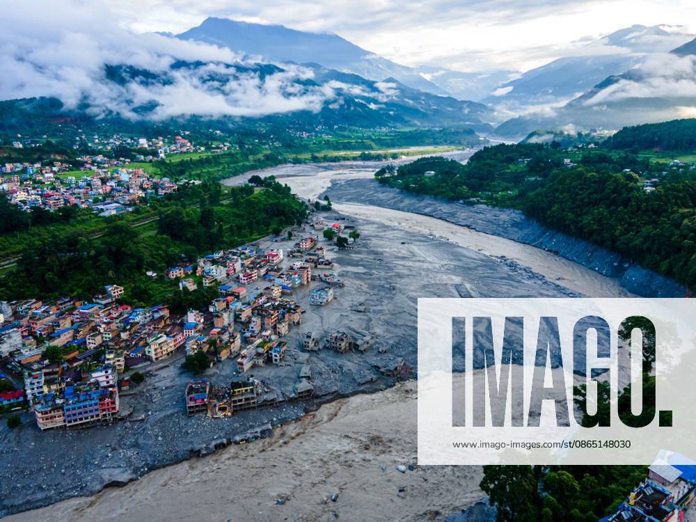 NUWAKOT, NEPAL †AUGUST 28, 2026: An aerial view shows the aftermath of severe flooding along the Bhotekoshi River in Nuwakot, Nepal. The flooding affected low-lying areas and settlements near the riverbanks, causing widespread damage to homes, roads, bridges, a hydropower station and other infrastructure. Several people remain missing as authorities continue to assess the extent of the disaster. Rescue teams and security personnel are conducting search and rescue operations in the affected areas. Nuwakot Nepal - ZUMAq101 20260828_zna_q101_127