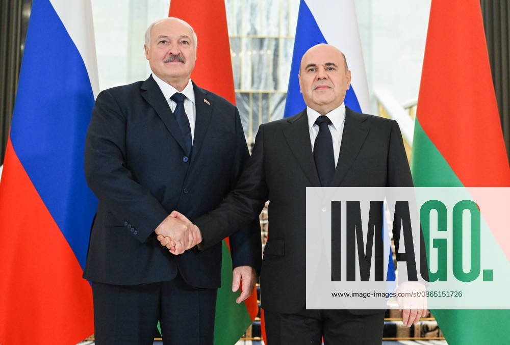 RUSSIA, MOSCOW - AUGUST 28, 2026: Russia s Prime Minister Mikhail Mishustin (R) and Belarus PresidentAlexander Lukashenko shake hands during a meeting at the House of the Russian Government. Alexander Miridonov POOL TASS 96737750