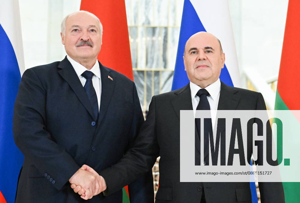 RUSSIA, MOSCOW - AUGUST 28, 2026: Russia s Prime Minister Mikhail Mishustin (R) and Belarus PresidentAlexander Lukashenko shake hands during a meeting at the House of the Russian Government. Alexander Miridonov POOL TASS 96737757