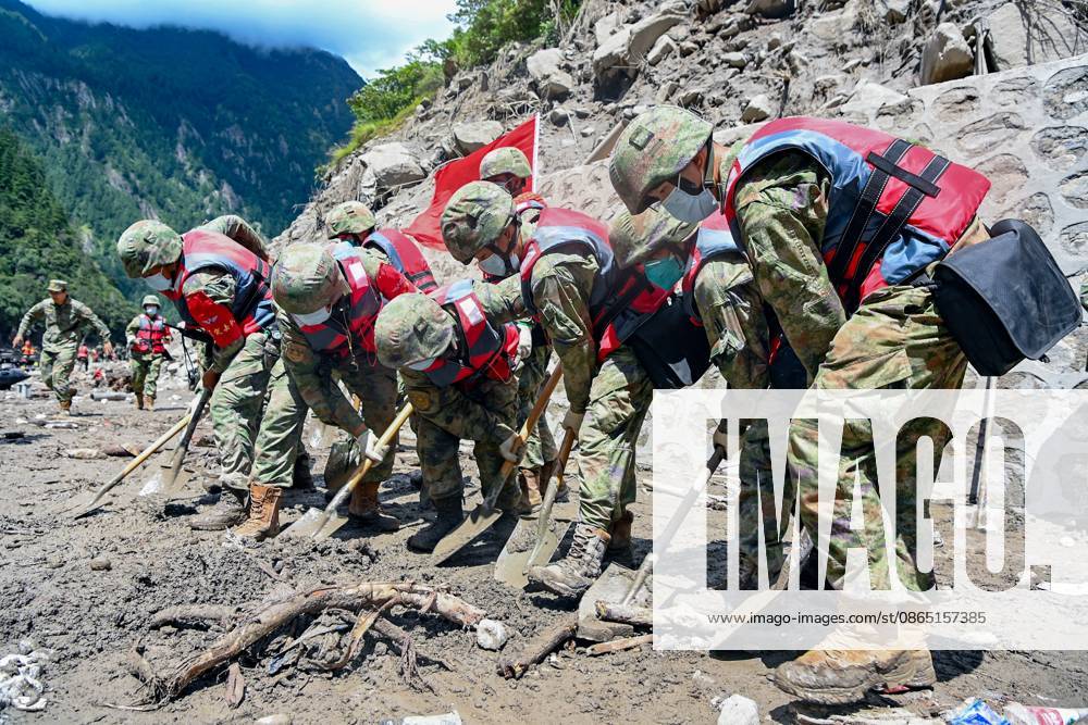 (260828) -- GYIRONG, Aug. 28, 2026 -- Rescuers from the Chinese People s Liberation Army work in a mudslide-hit area near Gyirong Port in Gyirong County, in Xigaze, southwest China s Xizang Autonomous Region, Aug. 28, 2026. The death toll had risen to five and 558 remained missing as of 3 p.m. on Friday after a mudslide struck the Gyirong Port along the China-Nepal border in southwest China s Xizang Autonomous Region, according to the region s emergency management department. Rescuers are operating around the clock in mudslide-affected areas near the Gyirong Port. (Photo by Zheng Chongxi Xinhua) (SpotNews) CHINA-XIZANG-XIGAZE-MUDSLIDE-RESCUE (CN) LiuxFang